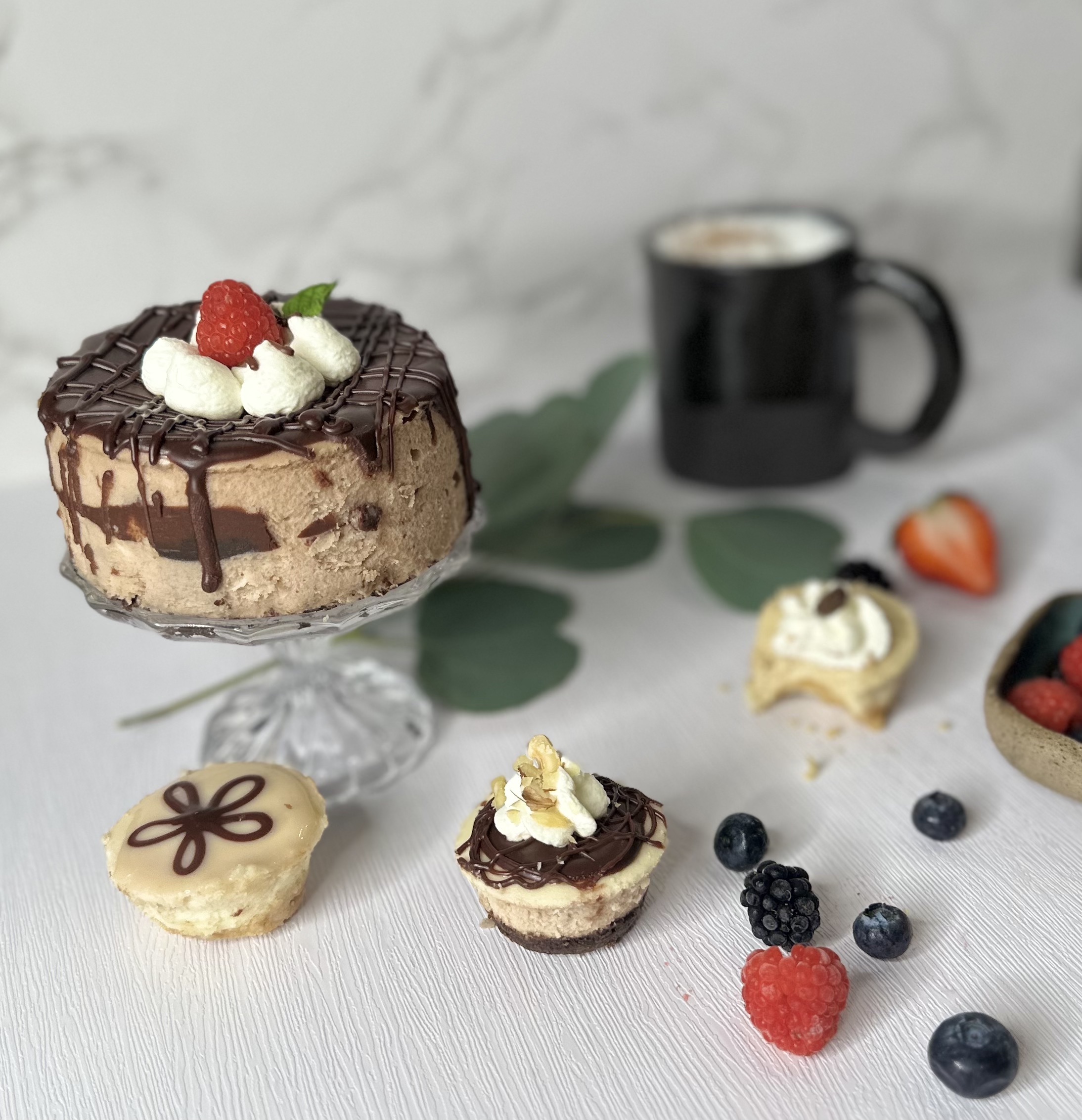 A variety of cheesecakes on a table.